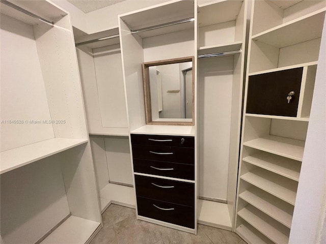 20185 E Country Club Dr Unit 1105, Aventura, FL 33180 - spacious closet featuring light tile patterned floors