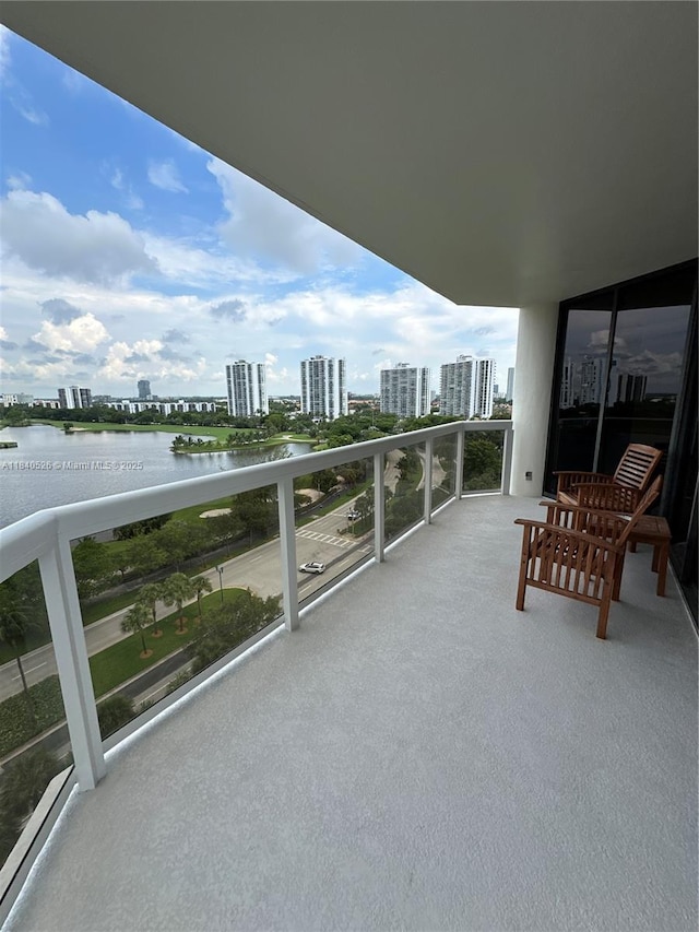 20185 E Country Club Dr Unit 1105, Aventura, FL 33180 - balcony featuring a city view and a water view