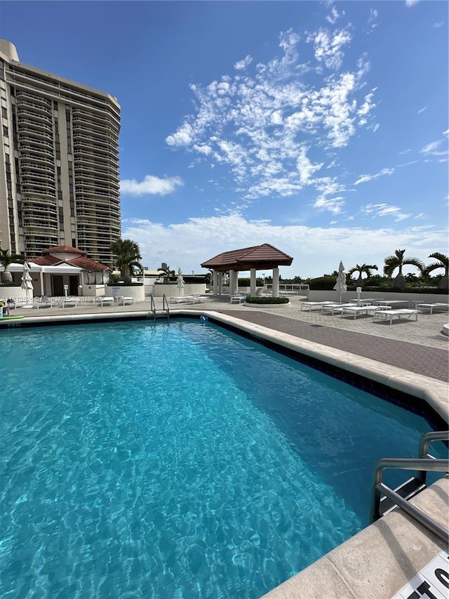 20185 E Country Club Dr Unit 1105, Aventura, FL 33180 - community pool featuring a gazebo and a patio