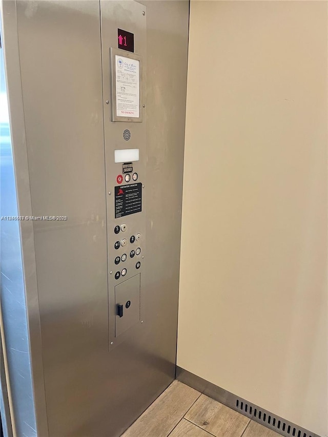 3201 W Flagler St Unit 102, Miami, FL 33135 - elevator featuring wood finished floors