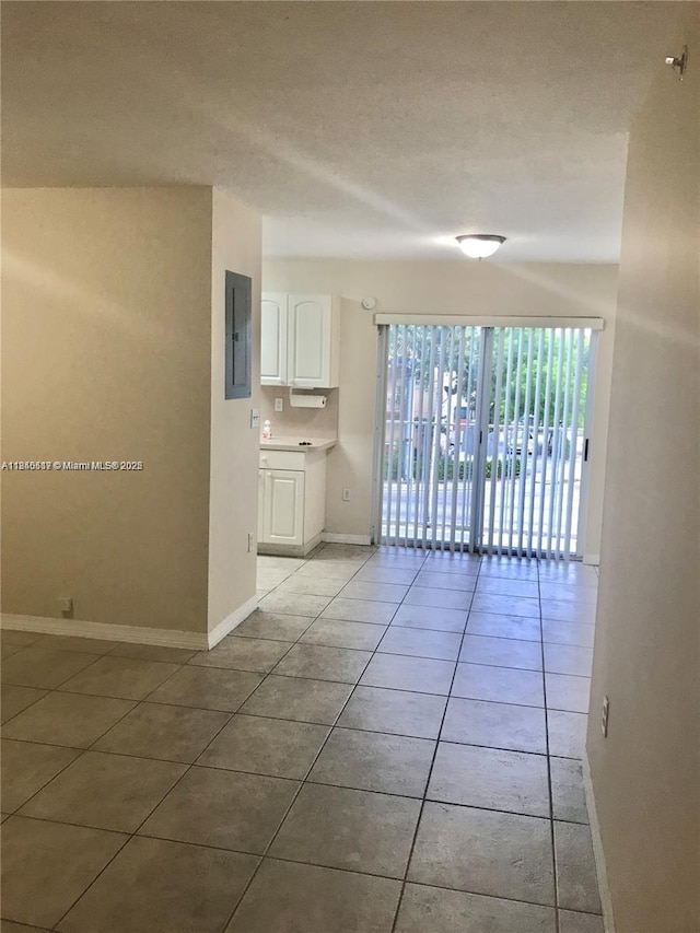 3201 W Flagler St Unit 102, Miami, FL 33135 - unfurnished room with light tile patterned floors and electric panel