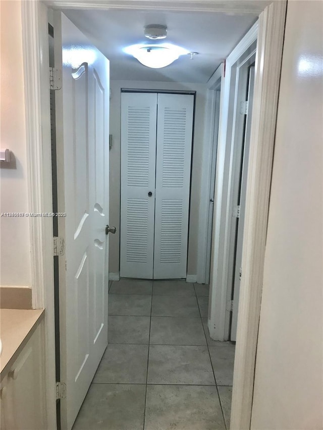 3201 W Flagler St Unit 102, Miami, FL 33135 - hall with light tile patterned flooring