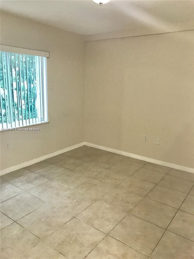 3201 W Flagler St Unit 102, Miami, FL 33135 - empty room featuring light tile patterned flooring