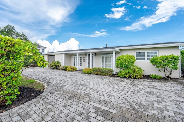 9370 SW 61st St, Miami, FL 33173 - ranch-style house with stucco siding and decorative driveway