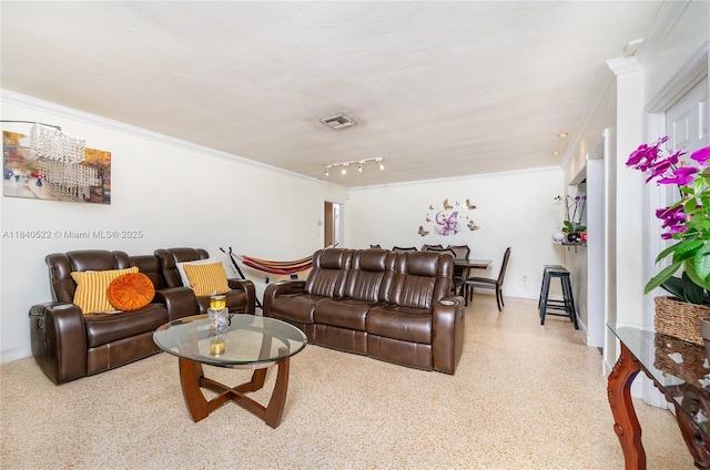 9370 SW 61st St, Miami, FL 33173 - living area with ornamental molding, track lighting, and speckle patterned floor
