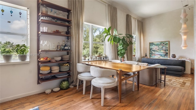 1521 Lenox Ave Unit 307, Miami Beach, FL 33139 - dining space with light wood-style floors and baseboards