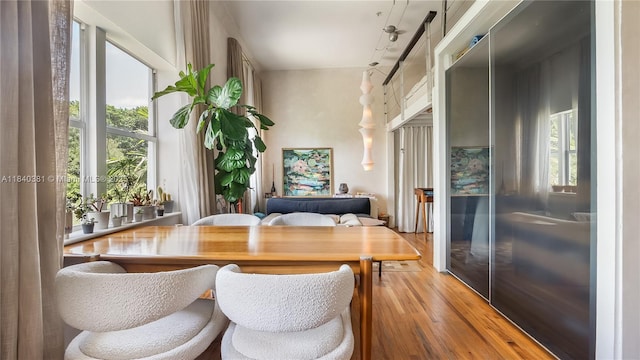 1521 Lenox Ave Unit 307, Miami Beach, FL 33139 - dining room with healthy amount of natural light and wood finished floors