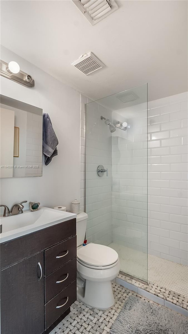 1521 Lenox Ave Unit 307, Miami Beach, FL 33139 - bathroom with vanity, walk in shower, and tile patterned flooring