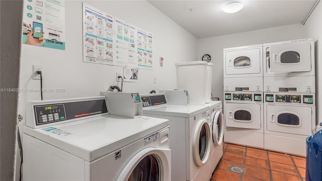 1521 Lenox Ave Unit 307, Miami Beach, FL 33139 - shared laundry featuring separate washer and dryer, stacked washer / dryer, and tile patterned floors