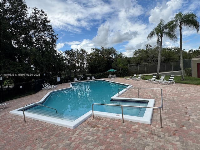1341 W Fairway Rd Unit 1, Pembroke Pines, FL 33026 - community pool featuring a patio