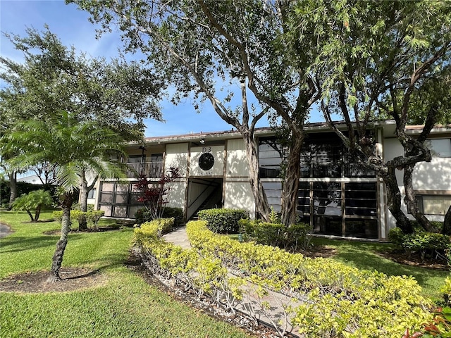 10415 E Clairmont Cir Unit 212, Tamarac, FL 33321 - view of front of property featuring a front lawn