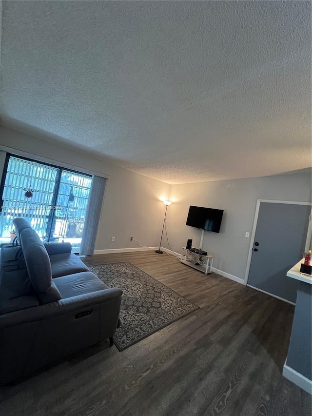 10415 E Clairmont Cir Unit 212, Tamarac, FL 33321 - living area with a textured ceiling and wood finished floors