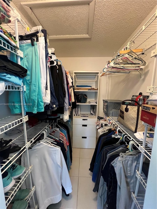 10415 E Clairmont Cir Unit 212, Tamarac, FL 33321 - walk in closet with tile patterned floors
