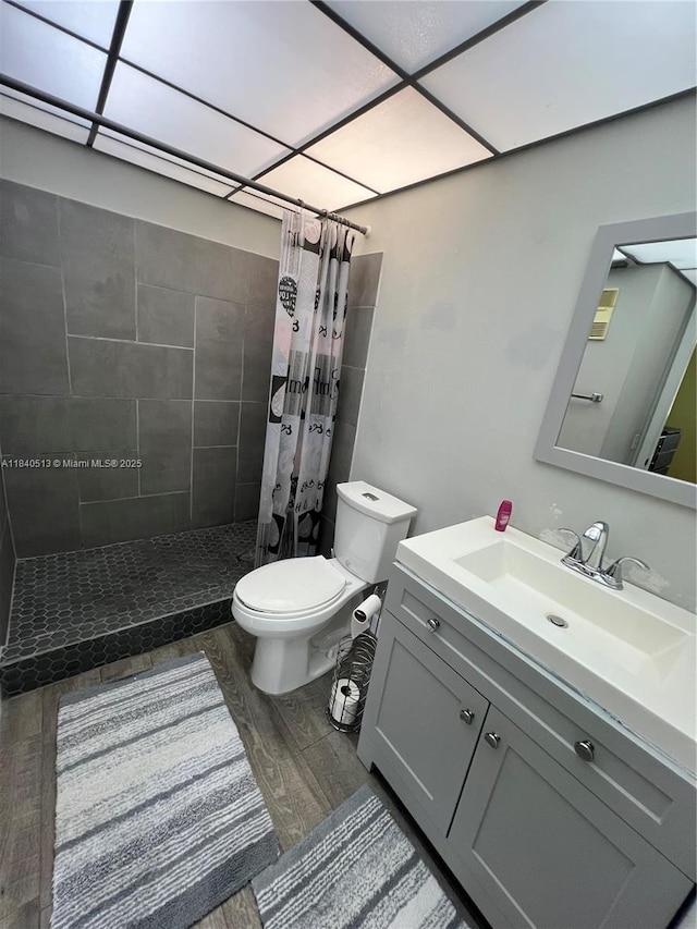 10415 E Clairmont Cir Unit 212, Tamarac, FL 33321 - full bathroom featuring wood finished floors, tiled shower, and vanity
