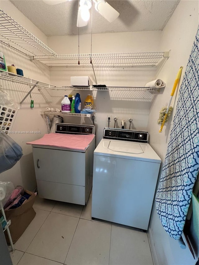 10415 E Clairmont Cir Unit 212, Tamarac, FL 33321 - washroom featuring washing machine and dryer, light tile patterned flooring, and ceiling fan