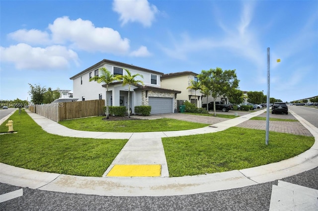 25009 SW 108th Ave, Homestead, FL 33032 - view of front of home with driveway, stucco siding, and a garage