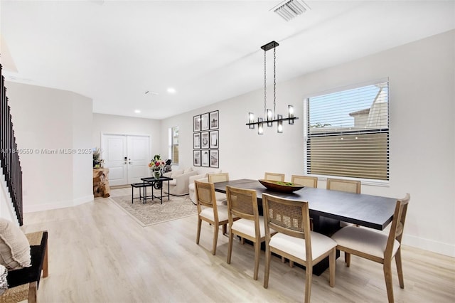 25009 SW 108th Ave, Homestead, FL 33032 - dining area with light wood-style floors and recessed lighting