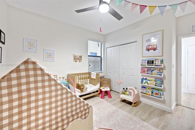 25009 SW 108th Ave, Homestead, FL 33032 - bedroom with light wood-style floors, a closet, and a ceiling fan