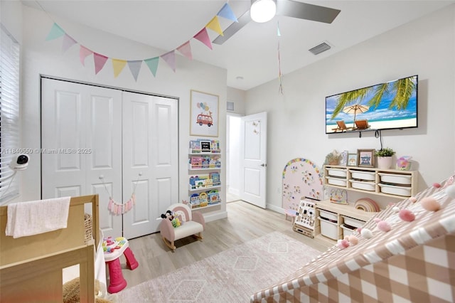 25009 SW 108th Ave, Homestead, FL 33032 - bedroom with light wood-style flooring, a closet, and ceiling fan