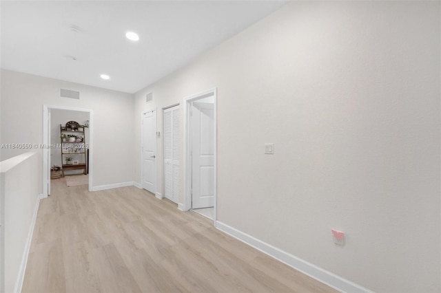 25009 SW 108th Ave, Homestead, FL 33032 - corridor featuring light wood-type flooring and recessed lighting