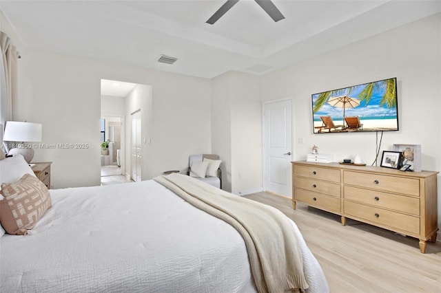 25009 SW 108th Ave, Homestead, FL 33032 - bedroom with light wood finished floors, connected bathroom, and a ceiling fan