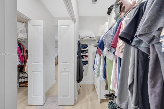 25009 SW 108th Ave, Homestead, FL 33032 - spacious closet featuring wood finished floors
