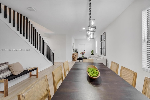 25009 SW 108th Ave, Homestead, FL 33032 - dining space with stairs, wood finished floors, and recessed lighting