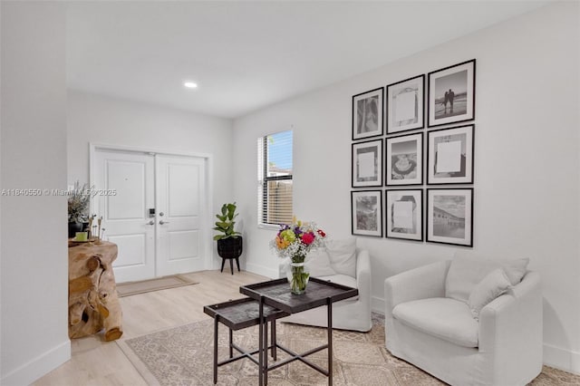 25009 SW 108th Ave, Homestead, FL 33032 - living area with light wood-style flooring and recessed lighting