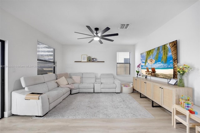 25009 SW 108th Ave, Homestead, FL 33032 - living area with a ceiling fan and wood finished floors