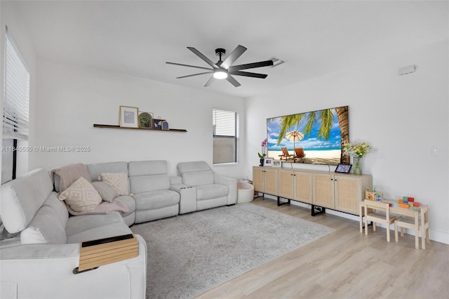 25009 SW 108th Ave, Homestead, FL 33032 - living area with wood finished floors and a ceiling fan