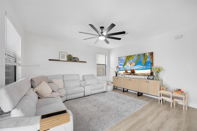 25009 SW 108th Ave, Homestead, FL 33032 - living room featuring light wood-style flooring and a ceiling fan
