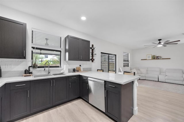 25009 SW 108th Ave, Homestead, FL 33032 - kitchen featuring a peninsula, healthy amount of natural light, light wood finished floors, dishwasher, and recessed lighting