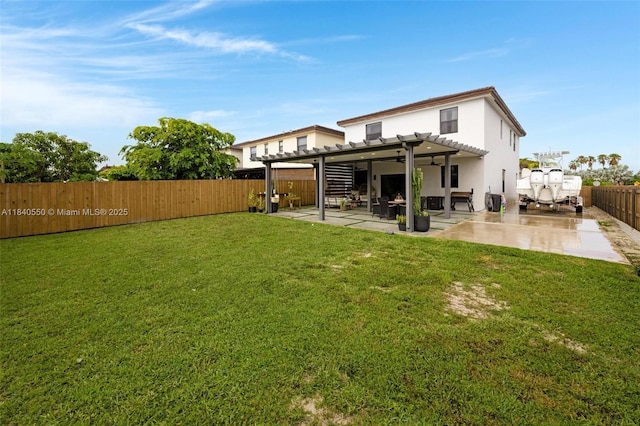 25009 SW 108th Ave, Homestead, FL 33032 - rear view of property featuring a pergola, a fenced backyard, stucco siding, and a patio