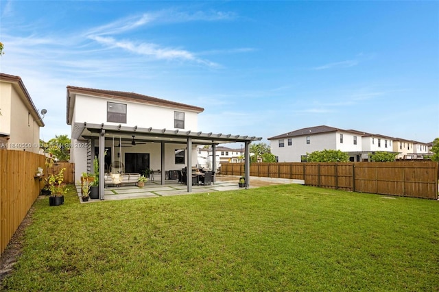 25009 SW 108th Ave, Homestead, FL 33032 - rear view of property featuring ceiling fan, a patio, a fenced backyard, and stucco siding