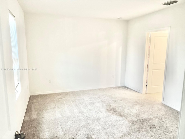 982 SW Alcantarra Blvd, Port St Lucie, FL 34953 - carpeted spare room featuring healthy amount of natural light