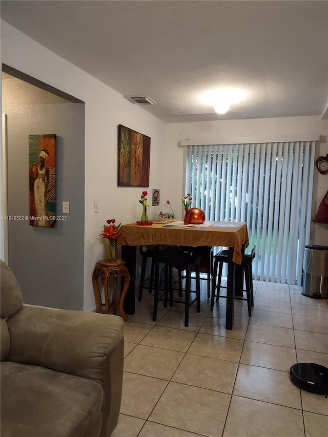 2506 Mayo St, Hollywood, FL 33020 - dining room with light tile patterned floors