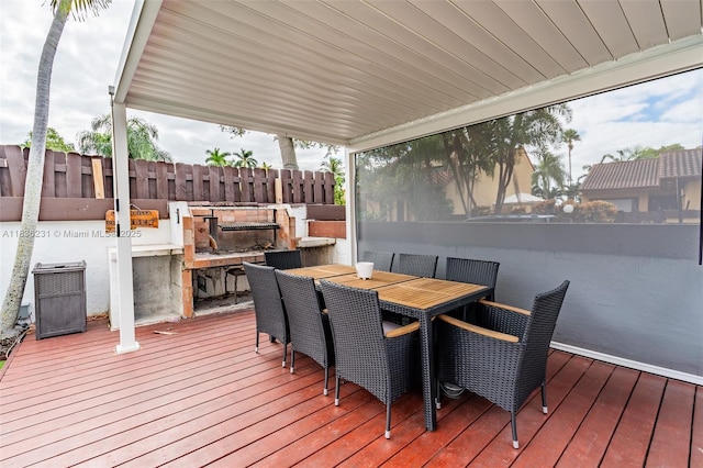 1000 NE 204th Ln Unit D, Miami, FL 33179 - wooden terrace with an outdoor kitchen and outdoor dining space