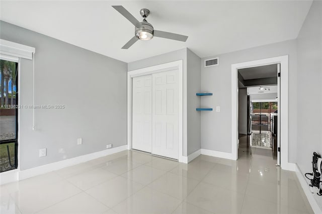 1000 NE 204th Ln Unit D, Miami, FL 33179 - hallway with tile patterned floors and baseboards