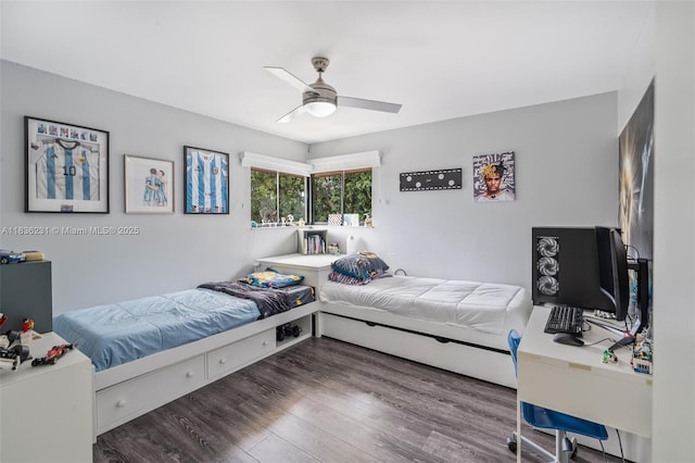 1000 NE 204th Ln Unit D, Miami, FL 33179 - bedroom with wood finished floors and ceiling fan