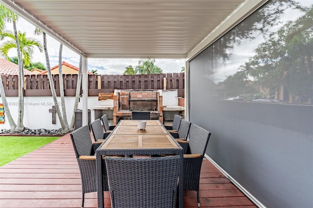 1000 NE 204th Ln Unit D, Miami, FL 33179 - wooden deck with outdoor dining area