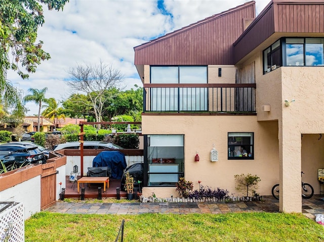 1000 NE 204th Ln Unit D, Miami, FL 33179 - view of home's exterior featuring stucco siding