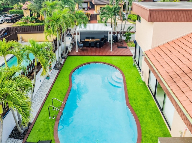 1000 NE 204th Ln Unit D, Miami, FL 33179 - view of pool featuring a fenced backyard and an outdoor hangout area