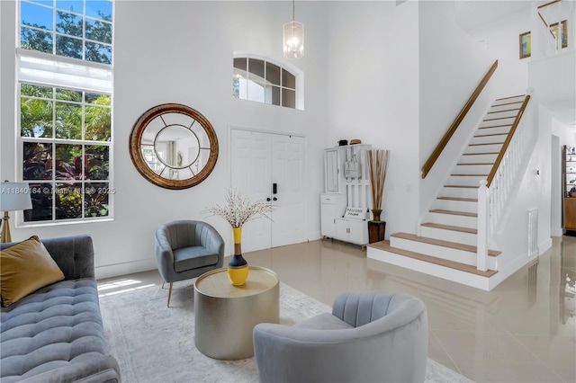 1204 Bayview Cir, Weston, FL 33326 - foyer entrance with stairs, a high ceiling, and tile patterned flooring