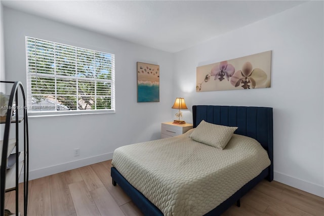 1204 Bayview Cir, Weston, FL 33326 - bedroom featuring baseboards and wood finished floors