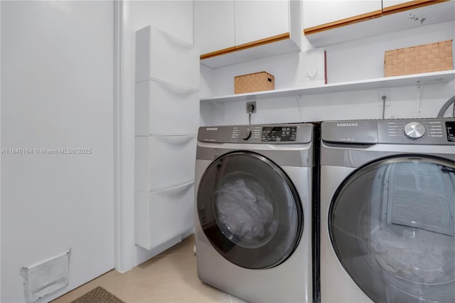 1204 Bayview Cir, Weston, FL 33326 - laundry area with washing machine and clothes dryer and light tile patterned floors