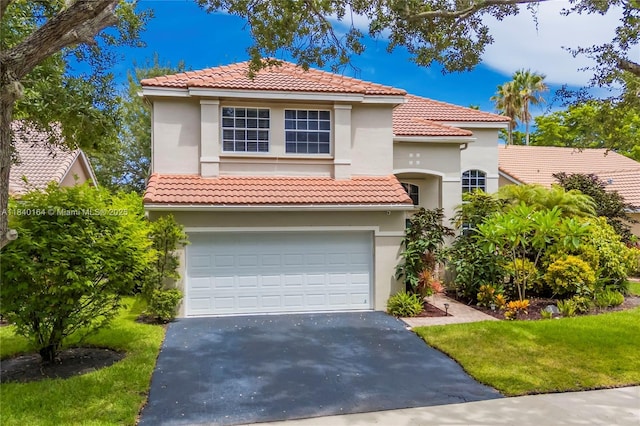 1204 Bayview Cir, Weston, FL 33326 - mediterranean / spanish house featuring driveway, stucco siding, a garage, a tiled roof, and a front yard