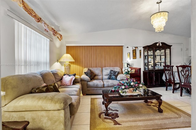 9530 W Daffodil Ln, Miramar, FL 33025 - living area with light tile patterned floors, lofted ceiling, a chandelier, and healthy amount of natural light