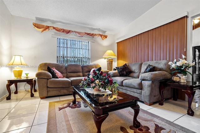 9530 W Daffodil Ln, Miramar, FL 33025 - living room with light tile patterned flooring and a textured ceiling