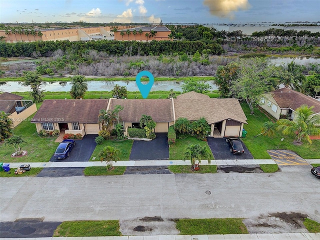 9530 W Daffodil Ln, Miramar, FL 33025 - aerial view of residential area featuring a large body of water