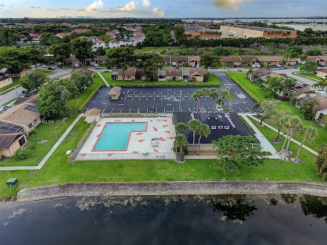 9530 W Daffodil Ln, Miramar, FL 33025 - aerial view of residential area with a nearby body of water and a pool area